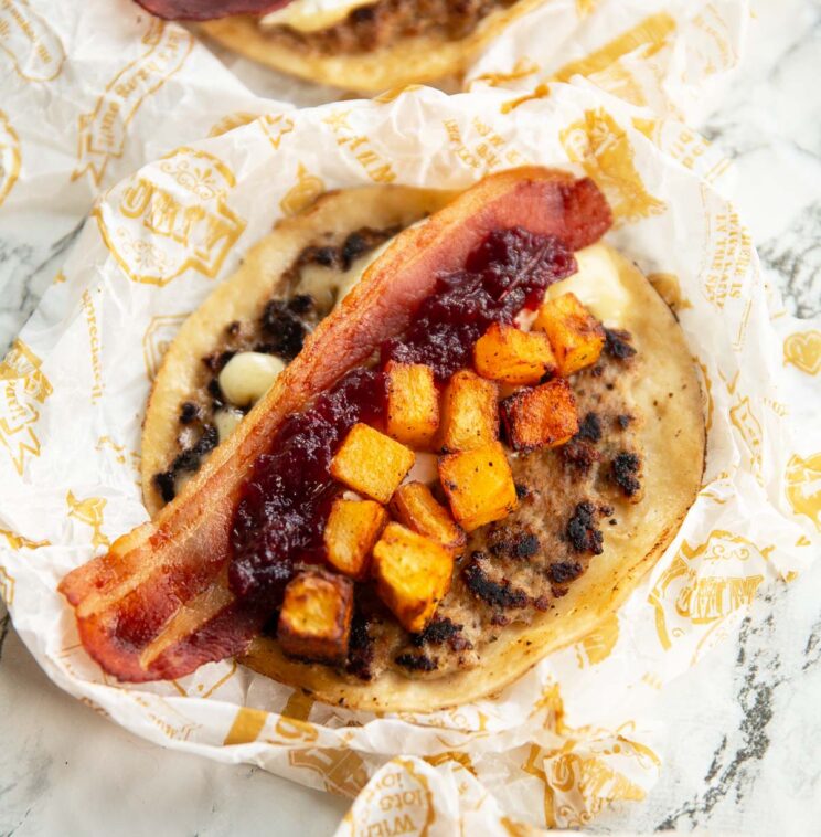 smash sausage taco smash sausage taco on scrunched of paper