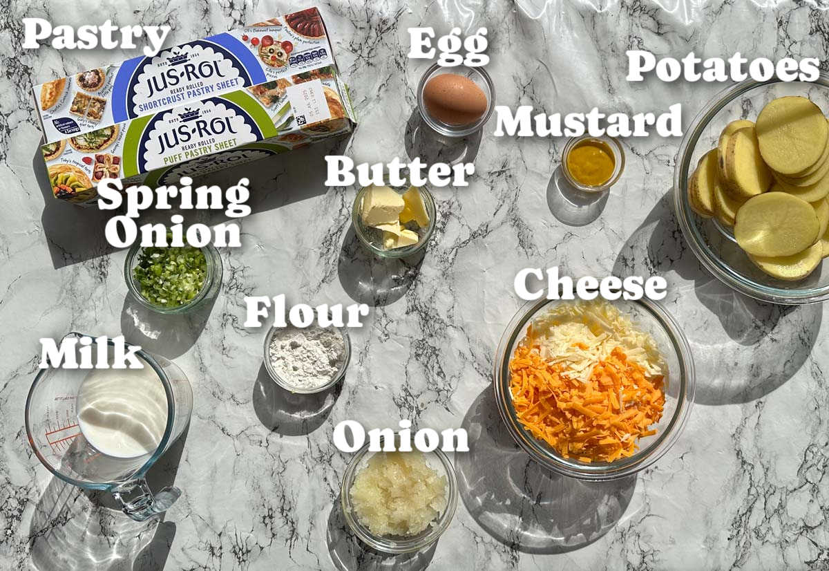 overhead shot of potato cheese and onion pie ingredients with text labels
