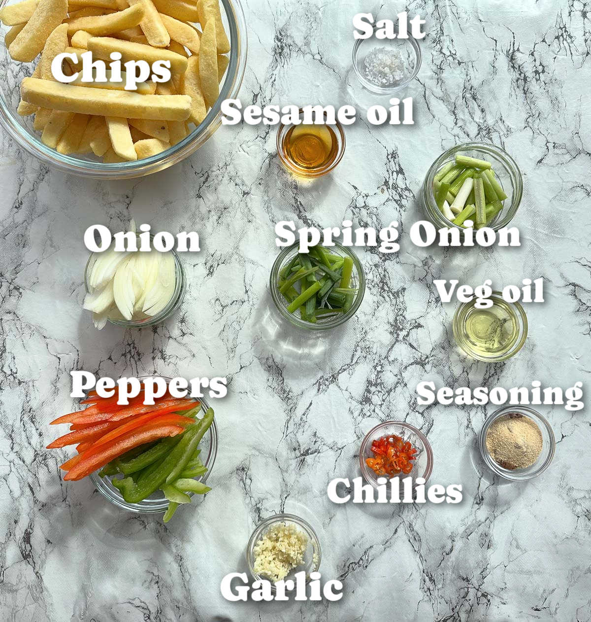 overhead shot of salt and chilli chips ingredients with text labels